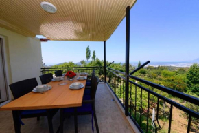 Kaş Üzümlü'de ki Manzaralı Reyhan Apart